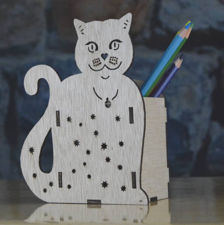 Desk tidy featuring a Cat design, laser cut from plywood at Tawny Barn